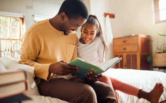 Father and Daughter reading